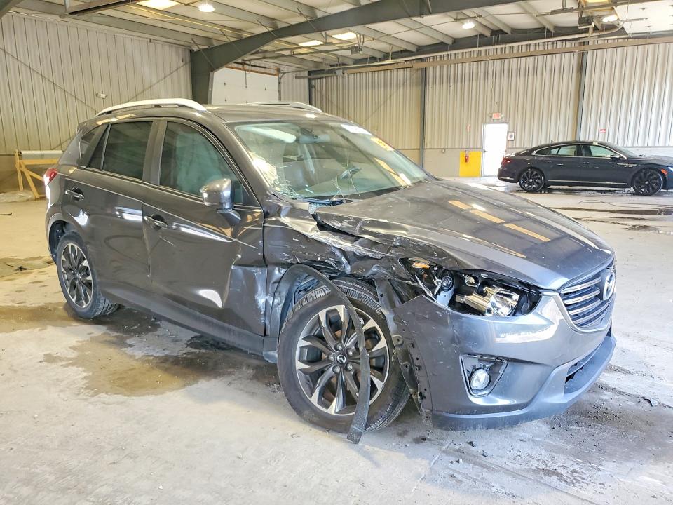 Photo 4 from auction – 2016 MAZDA CX-5 with VIN JM3KE2DY4G0868929