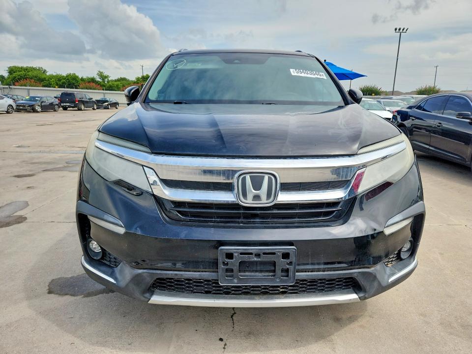 Photo 5 from auction – 2019 HONDA PILOT with VIN 5FNYF6H96KB019549