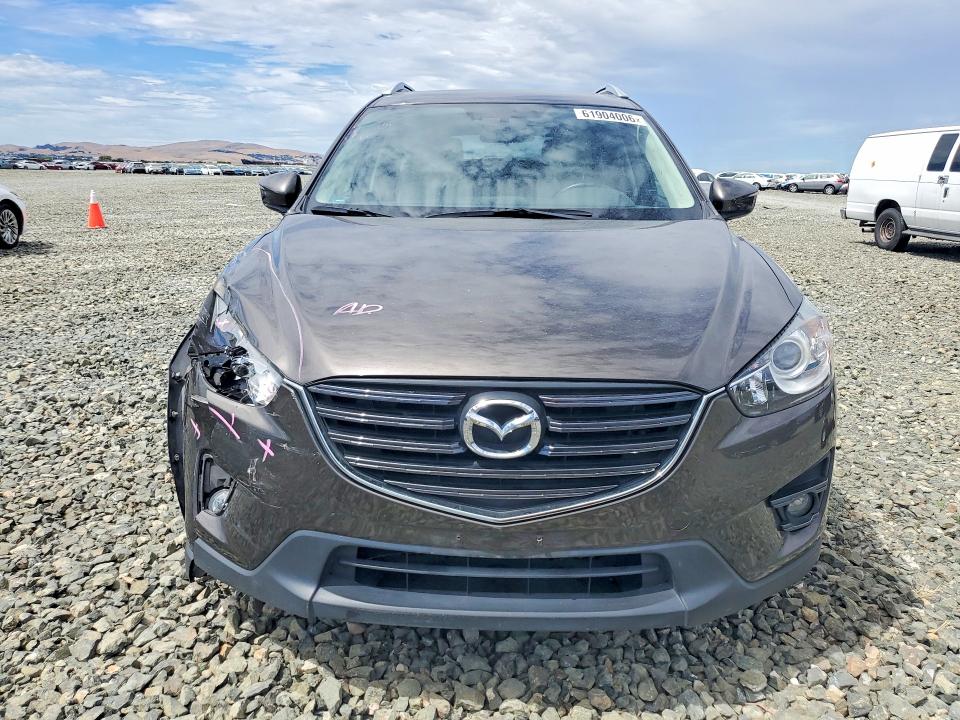 Photo 5 from auction – 2016 MAZDA CX-5 with VIN JM3KE2DY9G0815935