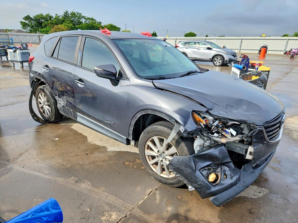 Photo 4 from auction – 2016 MAZDA CX-5 with VIN JM3KE2CY8G0825633