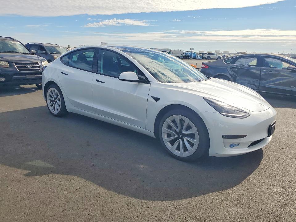 Photo 4 from auction – 2021 TESLA MODEL 3 with VIN 5YJ3E1EB2MF863064