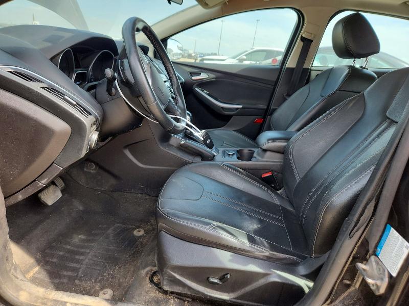 Снимка 7 от търг – 2014 FORD FOCUS с VIN 1FADP3N25EL187563