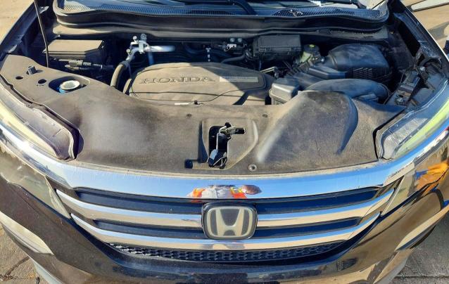 Снимка 12 от търг – 2016 HONDA PILOT с VIN 5FNYF5H98GB052487