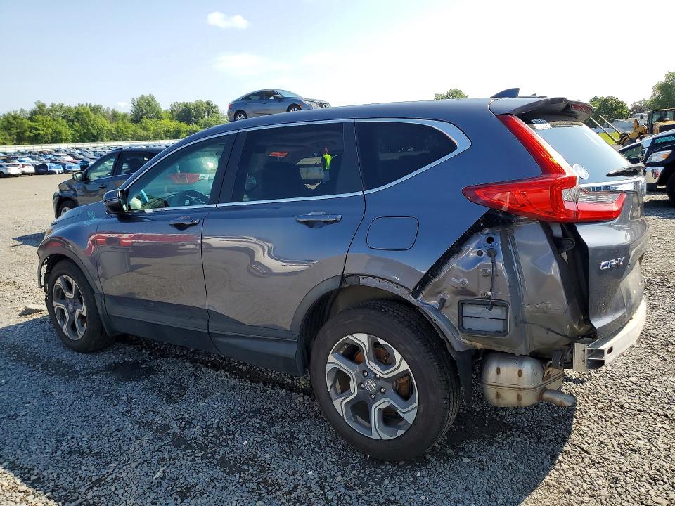 Photo 2 from auction – 2018 HONDA CR-V with VIN 7FARW2H52JE067515