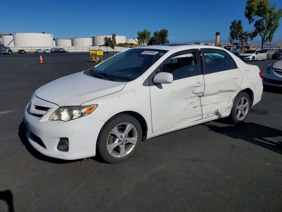 TOYOTA COROLLA 2011 with VIN 2T1BU4EEXBC558973 - Photo from auction