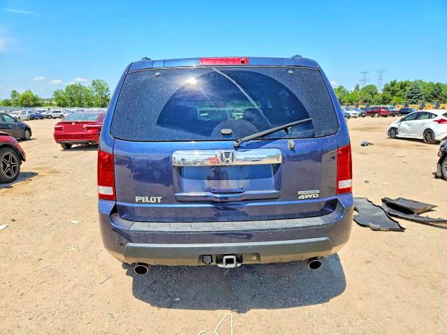 Photo 6 from auction – 2011 HONDA PILOT with VIN 5FNYF4H99BB024832