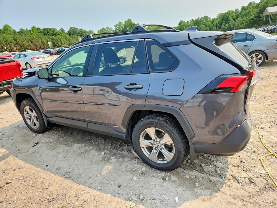 Photo 2 from auction – 2023 TOYOTA RAV4 HYBRID with VIN JTMRWRFV5PD188093