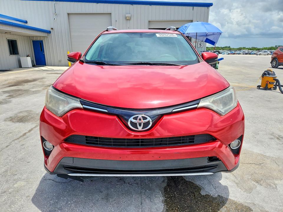 Photo 5 from auction – 2016 TOYOTA RAV4 with VIN 2T3WFREV8GW254899