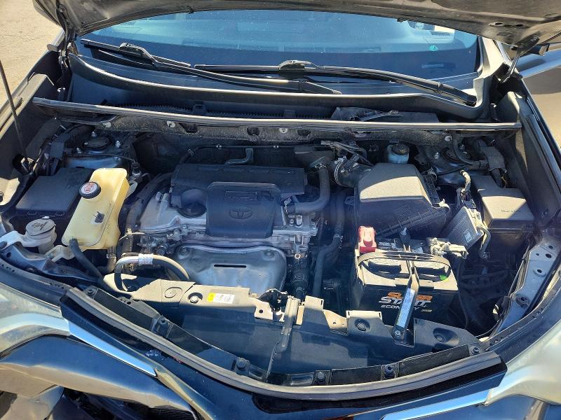 Photo 11 from auction – 2018 TOYOTA RAV4 with VIN JTMZFREV8JJ200974