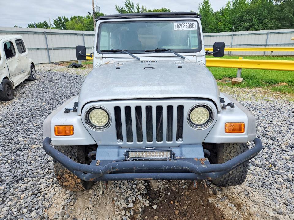 Photo 5 from auction – 2003 JEEP WRANGLER / TJ with VIN 1J4FA29103P313120