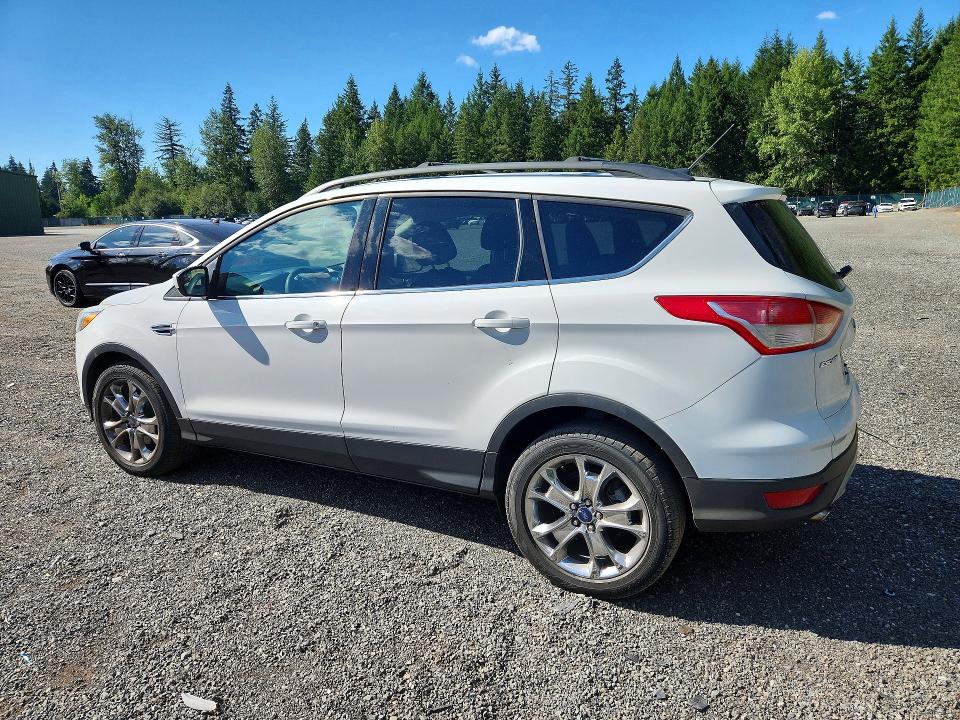 Photo 2 from auction – 2015 FORD ESCAPE with VIN 1FMCU9G98FUA31665