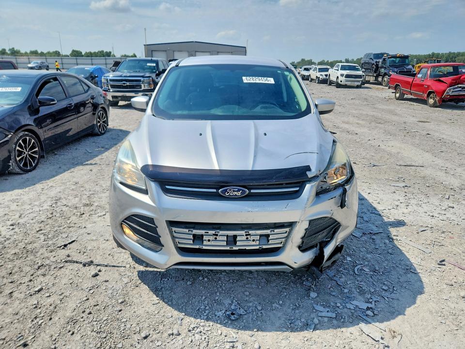 Photo 5 from auction – 2015 FORD ESCAPE with VIN 1FMCU0G96FUB32893