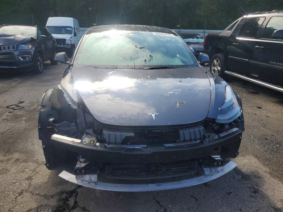 Photo 5 from auction – 2023 TESLA MODEL 3 with VIN 5YJ3E1EAXPF502421