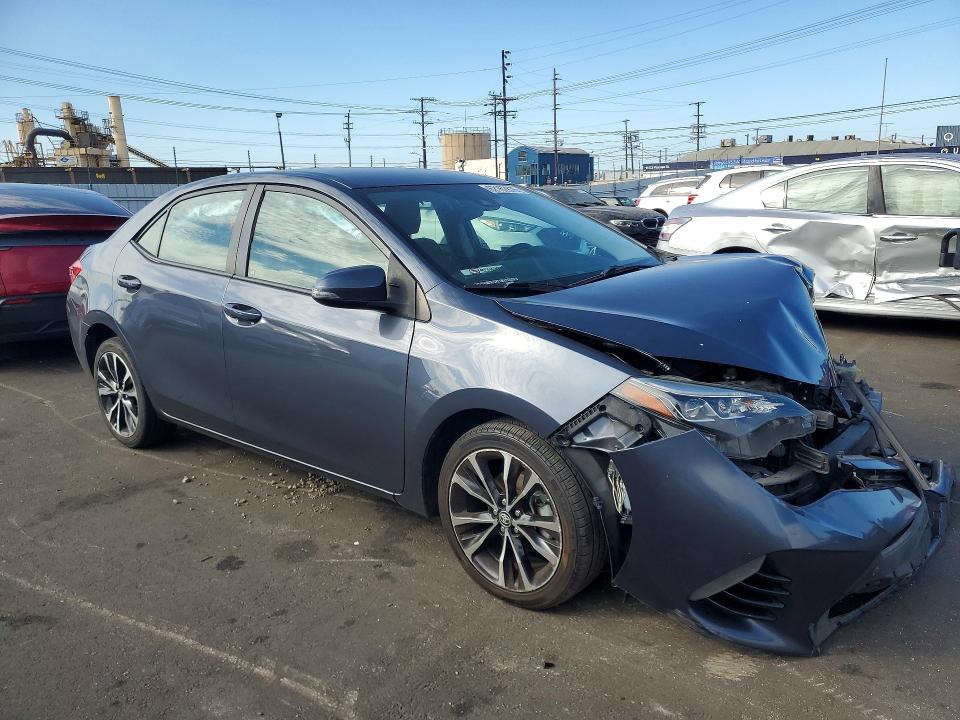 Photo 4 from auction – 2018 TOYOTA COROLLA with VIN 2T1BURHE5JC020186