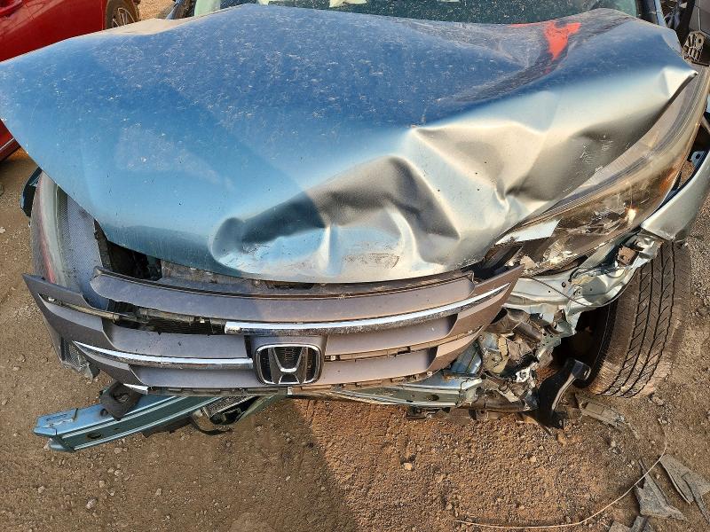 Photo 11 from auction – 2014 HONDA CR-V with VIN 2HKRM4H76EH711412