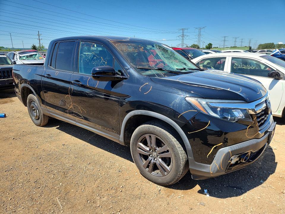 Photo 4 from auction – 2019 HONDA RIDGELINE with VIN 5FPYK3F18KB039283