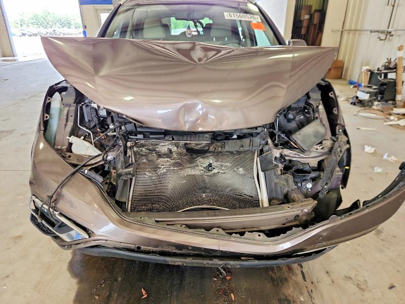 Photo 12 from auction – 2015 HONDA CR-V with VIN 2HKRM3H78FH500126