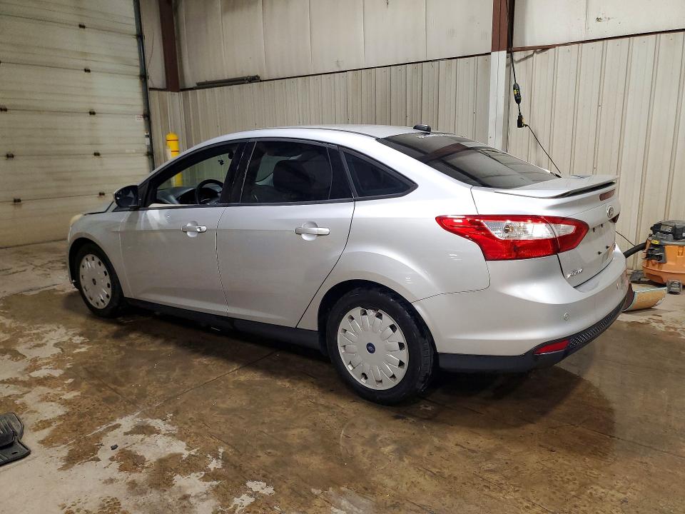 Снимка 2 от търг – 2014 FORD FOCUS с VIN 1FADP3F21EL224316