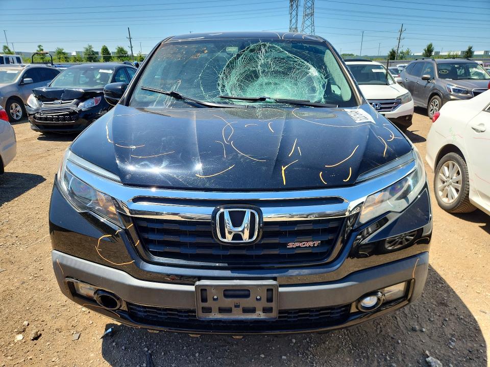 Photo 5 from auction – 2019 HONDA RIDGELINE with VIN 5FPYK3F18KB039283