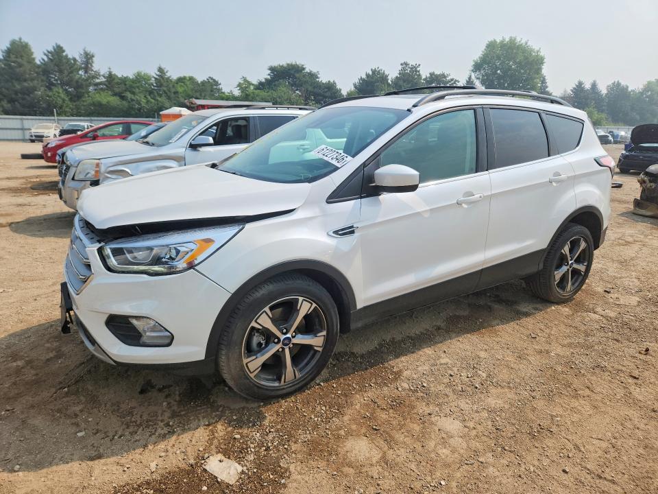 FORD ESCAPE 2018 with VIN 1FMCU9HD2JUC04768 - Photo from auction