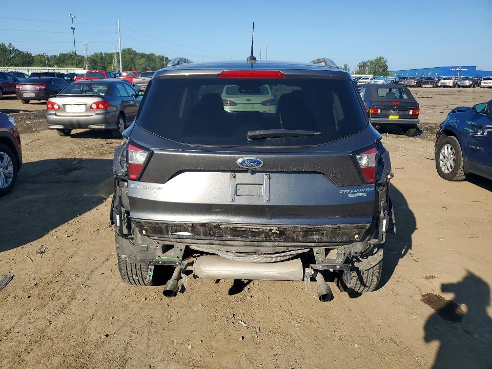 Photo 6 from auction – 2017 FORD ESCAPE with VIN 1FMCU0JD4HUD08436