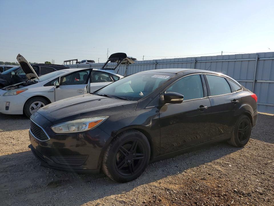 FORD FOCUS 2015 with VIN 1FADP3F23FL274023 - Photo from auction