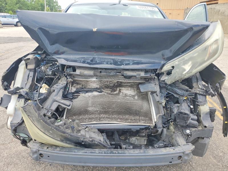 Photo 11 from auction – 2015 HONDA CR-V with VIN 3CZRM3H30FG707948