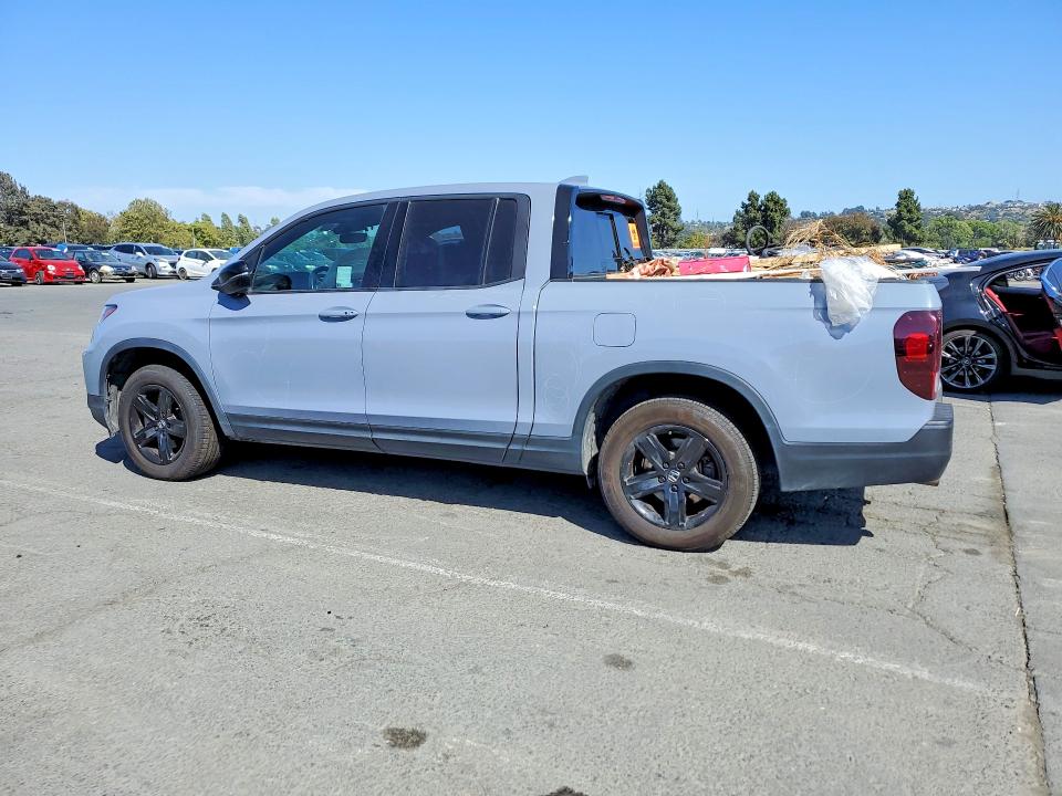 Photo 2 from auction – 2023 HONDA RIDGELINE with VIN 5FPYK3F85PB045093