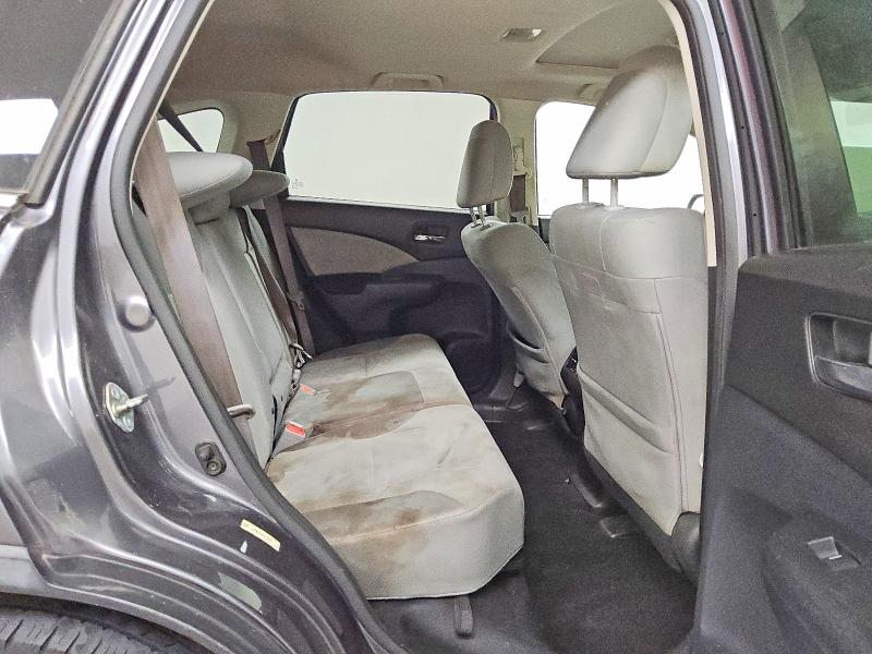 Photo 11 from auction – 2015 HONDA CR-V with VIN 3CZRM3H56FG708331