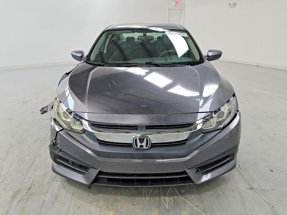 Photo 5 from auction – 2018 HONDA CIVIC with VIN 19XFC2F54JE203823