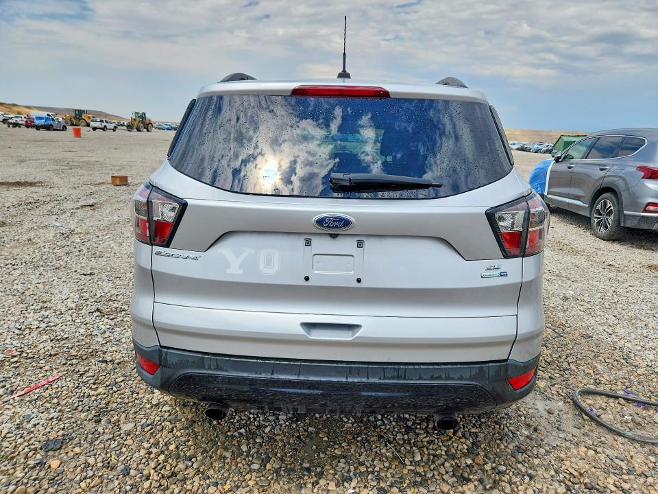 Photo 6 from auction – 2017 FORD ESCAPE with VIN 1FMCU9GD7HUE95523