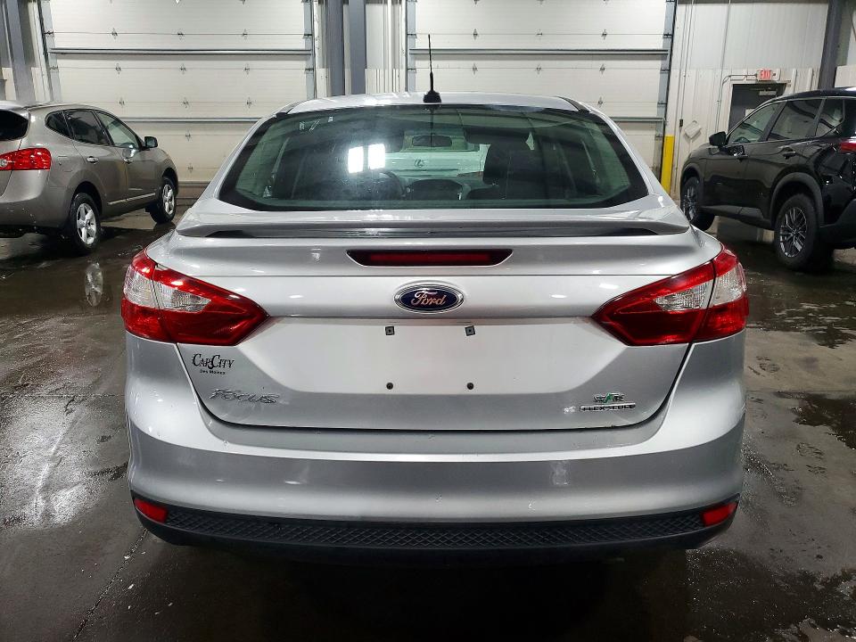 Photo 6 from auction – 2013 FORD FOCUS with VIN 1FADP3F29DL271026