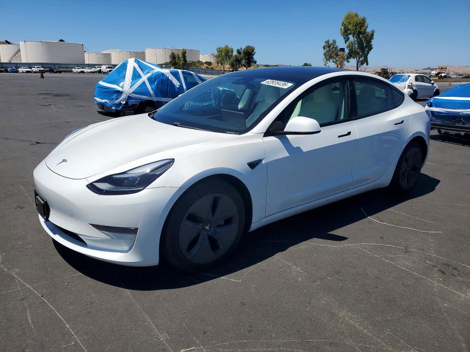 TESLA MODEL 3 2021 with VIN 5YJ3E1EA1MF989875 - Photo from auction