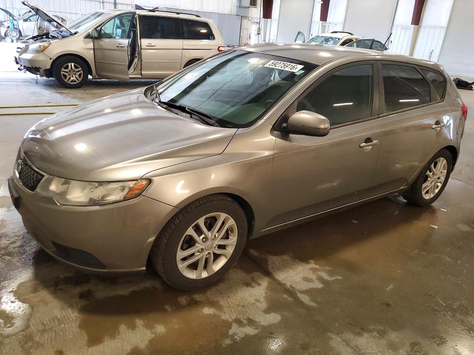KIA FORTE 2011 with VIN KNAFU5A24B5383892 - Photo from auction