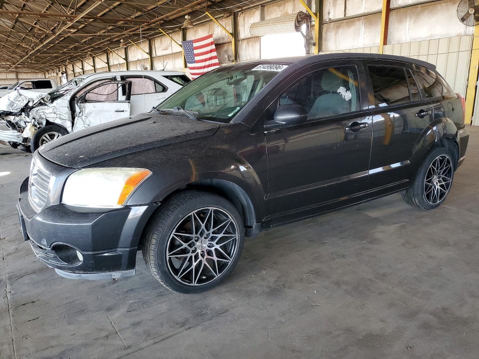 DODGE CALIBER 2011 with VIN 1B3CB3HA6BD110859 - Photo from auction
