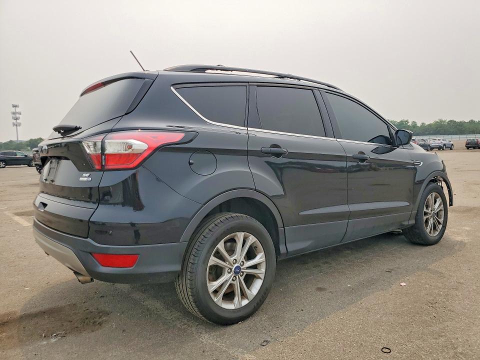 Photo 3 from auction – 2018 FORD ESCAPE with VIN 1FMCU9GD2JUA14891
