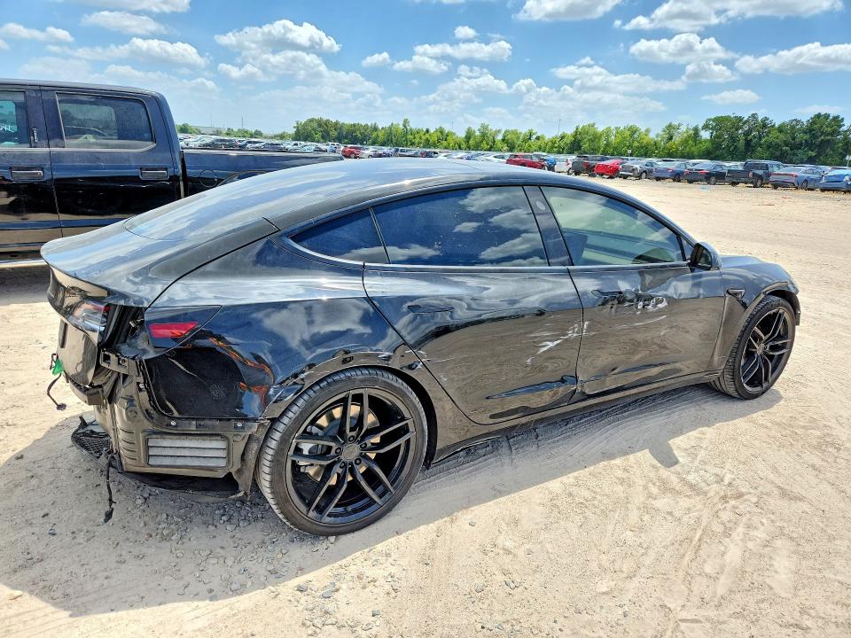 Photo 3 from auction – 2021 TESLA MODEL 3 with VIN 5YJ3E1EA0MF143740