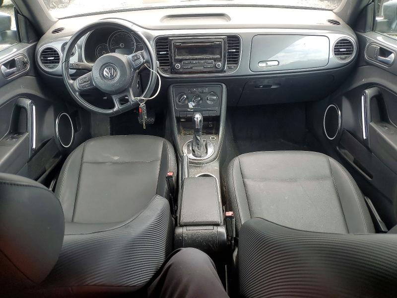 Photo 8 from auction – 2014 VOLKSWAGEN BEETLE with VIN 3VW5P7AT7EM802744