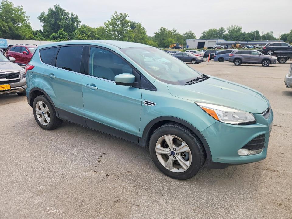 Photo 4 from auction – 2013 FORD ESCAPE with VIN 1FMCU9GX6DUB53825