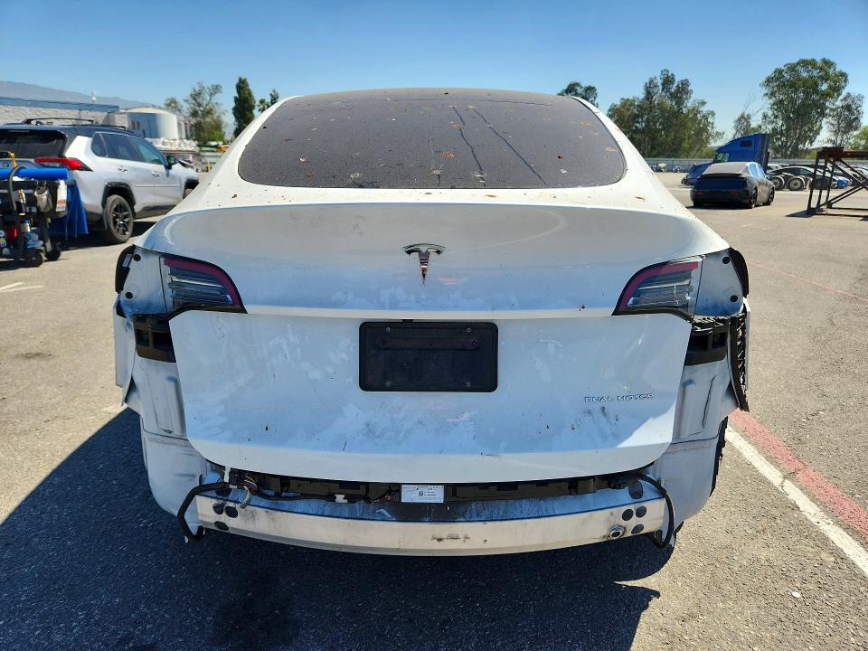 Photo 6 from auction – 2023 TESLA MODEL Y with VIN 7SAYGDEE4PA129350