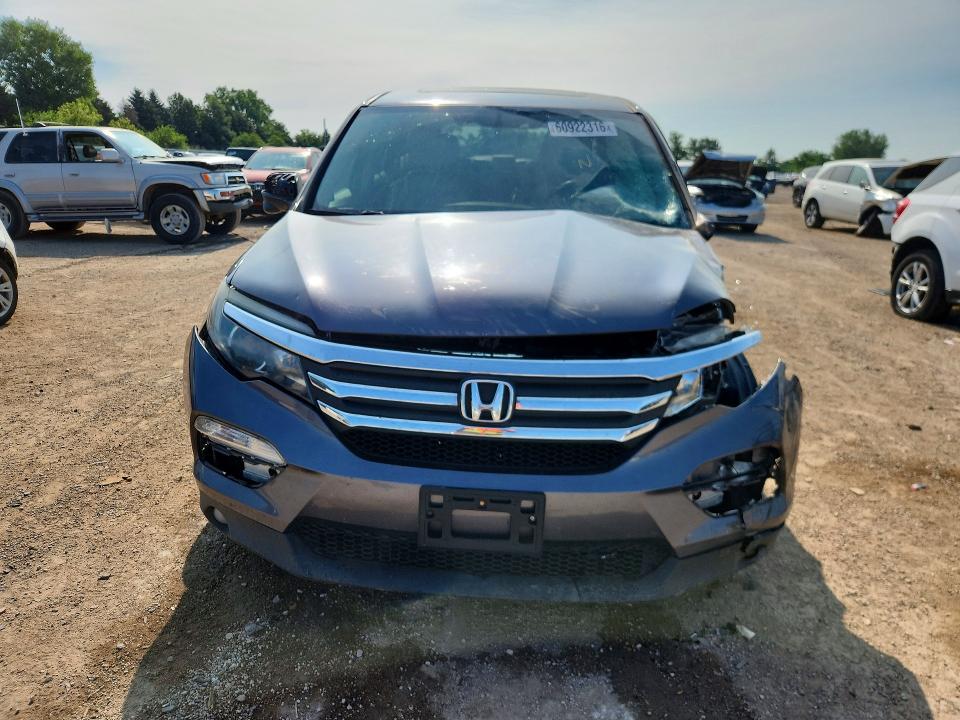 Photo 5 from auction – 2016 HONDA PILOT with VIN 5FNYF5H55GB023672