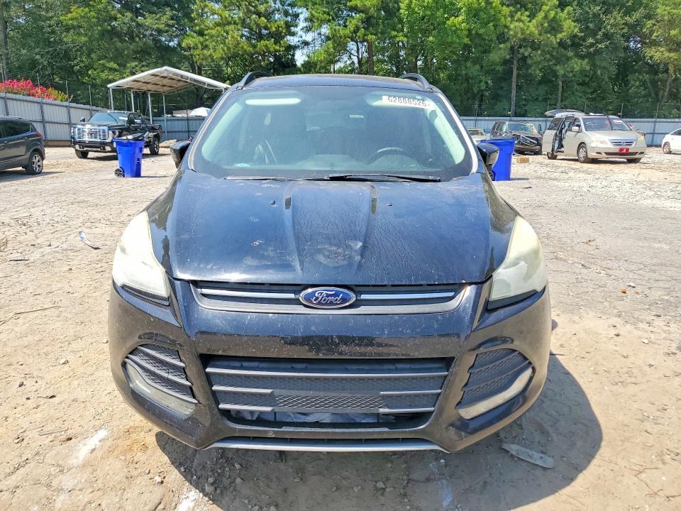 Photo 5 from auction – 2016 FORD ESCAPE with VIN 1FMCU0G96GUA72874