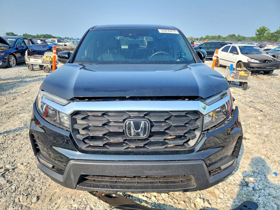 Photo 5 from auction – 2023 HONDA PASSPORT with VIN 5FNYF8H50PB013813