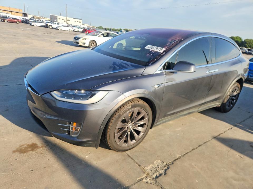 TESLA MODEL X 2018 with VIN 5YJXCAE25JF117775 - Photo from auction