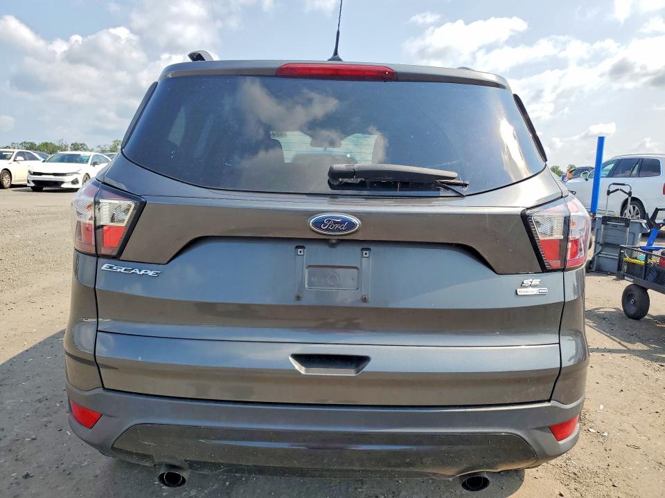 Photo 6 from auction – 2018 FORD ESCAPE with VIN 1FMCU9GD6JUB65930