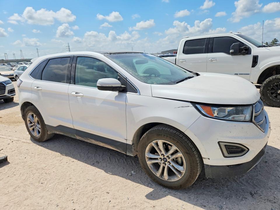 Photo 4 from auction – 2015 FORD EDGE with VIN 2FMTK3J92FBB70465