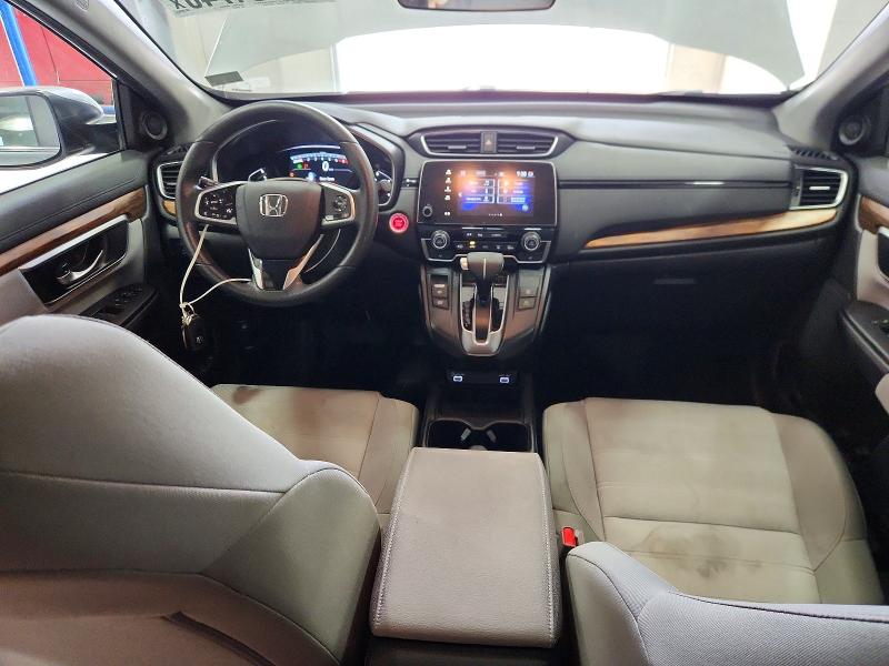 Photo 8 from auction – 2021 HONDA CR-V with VIN 7FARW2H50ME003316