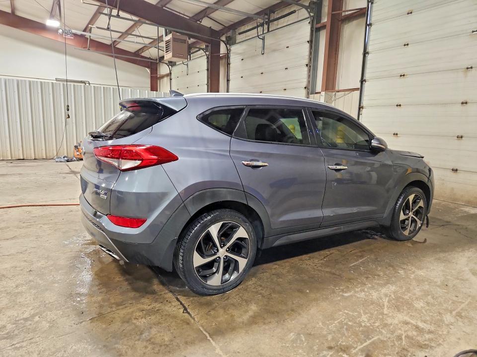 Photo 3 from auction – 2016 HYUNDAI TUCSON with VIN KM8J3CA29GU159000