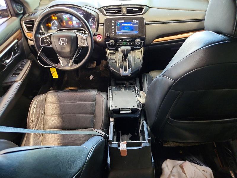 Photo 8 from auction – 2018 HONDA CR-V with VIN 7FARW2H93JE089994