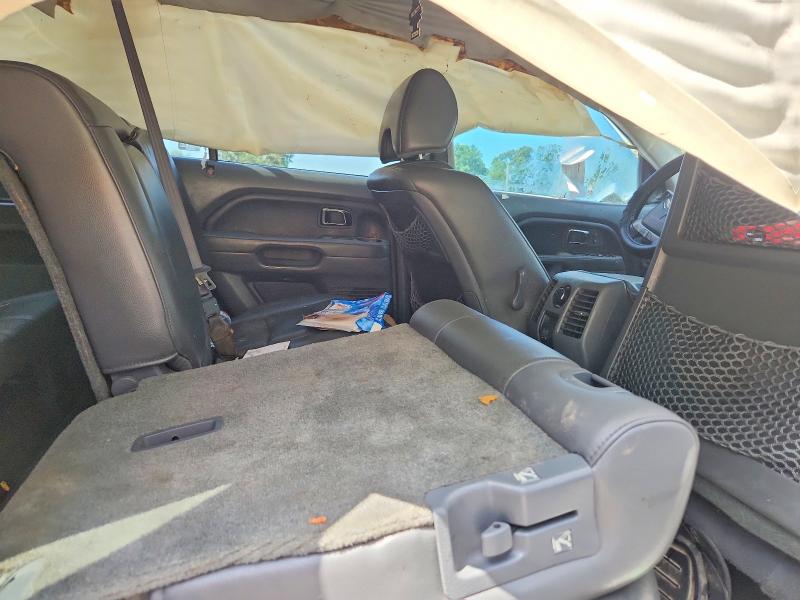 Photo 11 from auction – 2006 HONDA PILOT with VIN 2HKYF18586H560092